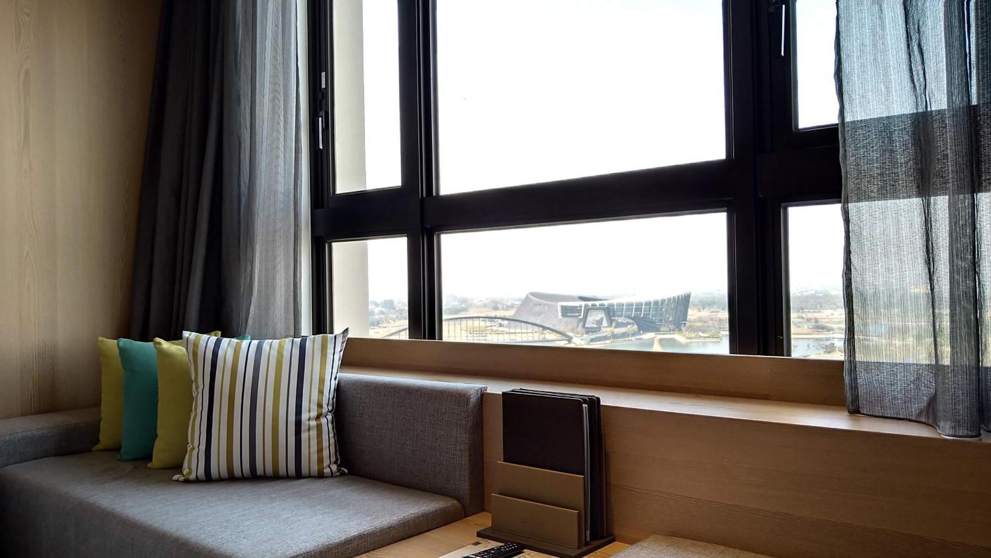 Evergreen Palace Hotel Chiayi Taibao Exteriér fotografie A window seat